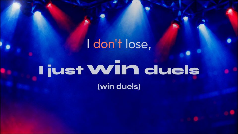 Lyrics glowing softly over blue and red stage lights